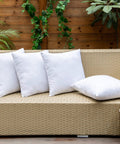 Pack Of 4 Outdoor Pillow Inserts Waterproof 18x18 Inch Square Cushions For Patio Garden Bed Sofa Couch Cozy Plush Inner Fill No Covers Included Great For Patio Or Garden Decor Weatherproof All Season Comfort on beige rattan sofa