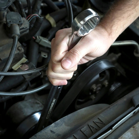 Person using Beefy Jumbo SAE Wrench Set Heavy Duty 1-1/16 Inch To 1-7/16 Inch with 12 Point Box End Wrenches on engine