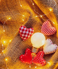 Plug In Fairy Lights 33ft 100 LED Twinkle String Lights With Remote Timer 8 Modes on burlap with decorative hearts