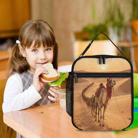 Desert Camel Train Insulated Lunch Bag For Women And Men Portable Cooler Tote next to a child having lunch at a table.
