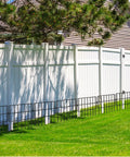 22 Pack No Dig Animal Barrier Fence Panels 16 Inch High With 1.5 Inch Gap installed along white garden fence