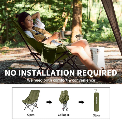 Woman sitting in Oversized Padded Camping Chair With 27.6 Inch Wide Seat, alloy frame, in forest setting.
