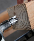 Wood Lathe MT2 Centers Set With Live Center Five Eighths Inch Diameter And Four Pronged Drive Center One Inch Diameter includes black storage box ball bearing live center delivers smooth concentric turning fits wood lathes for your shop, close-up of drive center on wood.