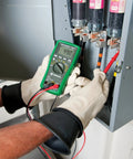 Pro Grade Digital Multimeter DM45 600V AC DC, 10A Auto Range used by electrician testing voltage in electrical panel