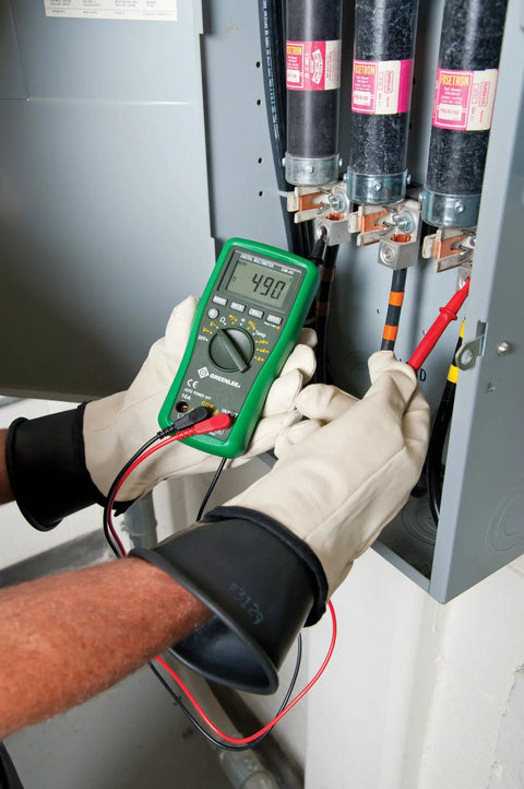 Pro Grade Digital Multimeter DM45 600V AC DC, 10A Auto Range used by electrician testing voltage in electrical panel