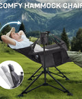 Person relaxing outdoors in Oversized Padded Hammock Camping Chair With Detachable Cup Holder Heavy Duty Swing Seat