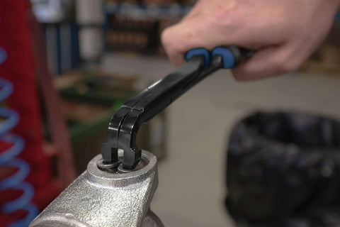 Close-up of 75 Degree U Joint Snap Ring Pliers Pro Grade For Automotive And Medium Duty Trucks Cars Equipment And ATV UTV 70301 in use