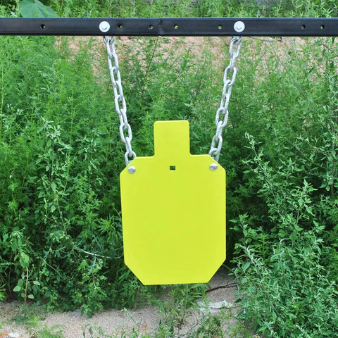 AR500 Steel Target For Real Shooters, IDPA IPSC Torso Silhouette Metal Target With Laser Cut Precision hanging in a field
