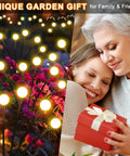 Solar Garden Lights Outdoor 4 Pack Swaying LED Fairy Lights illuminating flowers with elderly woman gifting present, waterproof design.