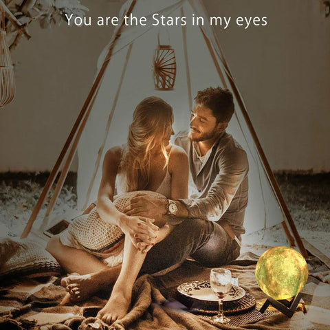 Couple sitting with Moon Galaxy Lamp Night Light For Kids With 16 Colors 3D LED Moon With Stand Remote And Touch Control Dimmable