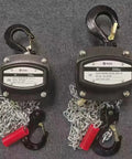 Built Tough Manual Chain Block Hoist 2 Pack Featuring Hella Strong Galvanized Steel Chain And 2200 Lb Capacity With 30 Ft Length For No Sweat Industrial Rigging, showing hoists with hooks and chains.