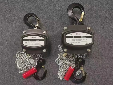 Built Tough Manual Chain Block Hoist 2 Pack Featuring Hella Strong Galvanized Steel Chain And 2200 Lb Capacity With 30 Ft Length For No Sweat Industrial Rigging, showing hoists with hooks and chains.