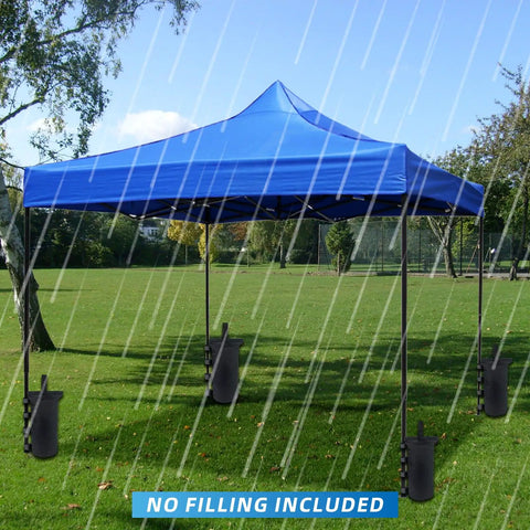 Blue pop-up tent with Beefy Heavy Duty Canopy Weight Bags Set of 4 for Pop Up Tents 30 Lbs Capacity Per Bag in rainy park.