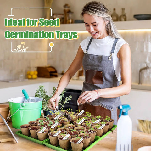 Person using 3.2 Inch Biodegradable Peat Pots With Drainage Holes, 50 Pack Seedling Starters Kit With 100 Plant Markers in kitchen