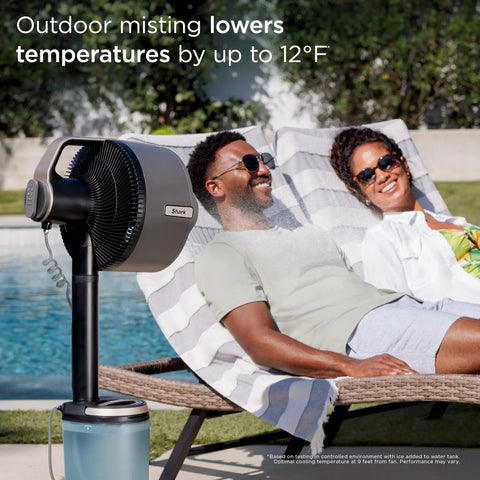 FlexBreeze Pro Mist Fan Indoor Outdoor Chill Machine With Built-In Misting beside a pool providing cooling to two people on loungers