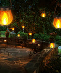 2 Pack Gen2 Solar Lantern Lights With USB C Ultra Real Flame Warm White illuminating outdoor patio at night