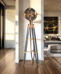 Top Shelf Retro Hollywood Inspired Tripod Floor Clock With Solid Wood Stand, Satin Black Finish, Aged Bronze Accents, Smooth Operator Gear Dial, Real Deal Vintage Flex Piece For Modern Living Spaces in a stylish living room.