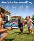 Children excitedly receiving a box of Two Pack RC Boats For Kids Ready To Race With 7 Mode LED Lights Water Spray Dual Batteries.