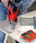 Person using drill next to Titanium Coated Drill Bit Set 21 Pcs With Hex Shank 135 Degree Tip High Speed Steel Kit on table