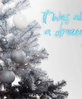 Blue USB Neon Sign for Wall Decor It Was All a Dream LED Neon Light next to decorated winter tree with gray ornaments