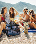 Group enjoying beach picnic with Leakproof Insulated Picnic Backpack Cooler Bag With 30L Capacity For Beach, Camping, And Outdoor Adventures