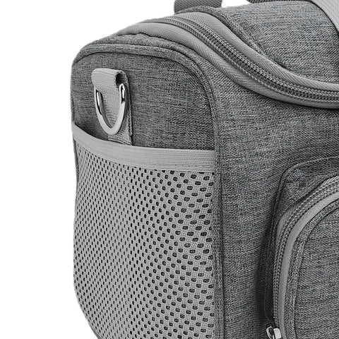 Close-up of Heavy Duty Canvas Carrying Case for Cutting Machines showing mesh pocket and padded storage bag with protective lining.