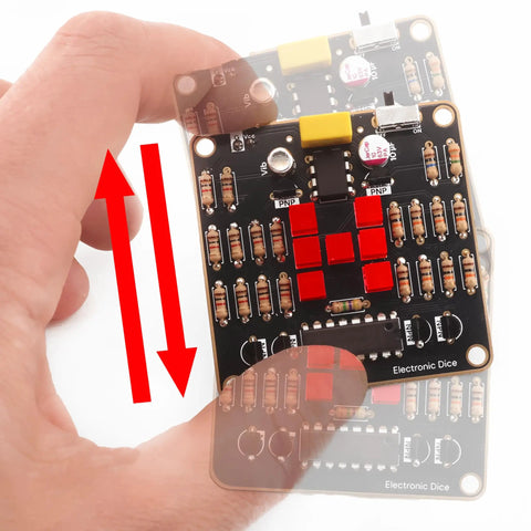 Electronic Dice Soldering Kit For Beginners And Students DIY LED Dice Circuit shown in hand with visible components