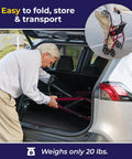 Man folding the Rock Solid Red Rollator Walker With Cushy Seat And Steel Frame for easy transport in a vehicle.