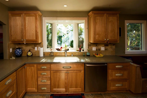 Kitchen with installed antique brass cabinet pulls 5 inch center to center din cup handles retro style zinc alloy set of 6.
