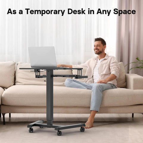 Mobile Standing Desk With Keyboard Tray And Wheels in use with laptop, Height Adjustable Portable Computer Workstation for Living Room