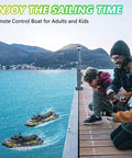 Family enjoying High Speed RC Boat For Kids And Adults With Jet Pump Propulsion 20 KMH Shallow V Hull Hidden Propeller ABS Hull on lake.