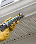 Heavy Duty Polyurethane Construction Adhesive Sealant White Non Sag Formula applied with caulking gun indoors.