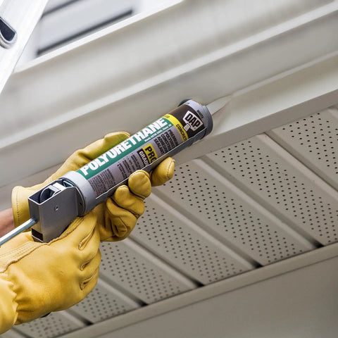 Heavy Duty Polyurethane Construction Adhesive Sealant White Non Sag Formula applied with caulking gun indoors.