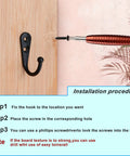 Installation guide for 15 Piece Black Wall Mounted Coat Hook Set With 30 Screws showing hook and screwdriver on wooden board.