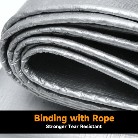 Close-up of Heavy Duty Waterproof Poly Tarpaulin 12x25 Feet Silver Black with reinforced edges, highlighting tear-resistant rope binding.