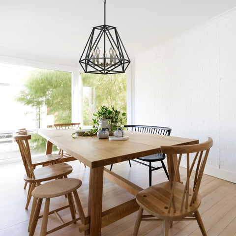 Juliet 1-Light Industrial Chandelier In Matte Black With Open Socket Design And Hanging Chain in dining room setting