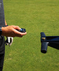Pro Level Electric Golf Cart With Smart Remote Control And All Terrain Grip For Smooth Walking Assistance and Go The Distance Rounds featuring remote in use.