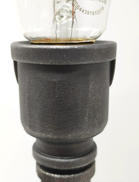 Close-up of steampunk style Pipe Lamp Socket For Half Inch NPT Pipe In Black Finish with Edison bulb base