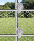 5 Inch Sliding Gate Rollers Galvanized Steel For One And Five Eighths Inch Pipe Track Pack Of Two Durable For Smooth Low Resistance Gate Operation And Long Lasting Corrosion Resistant Performance installed on a chain-link fence.