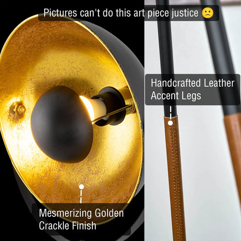 Lit Modern Tripod Floor Lamp In Black Finish With Gold Foil Circular Shade And Leather Accented Legs, close-up on gold finish