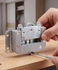 Hands adjusting Door Sliders For Wardrobe And Cabinet With Damping Pulley System Smooth Glide For Wooden Doors on wooden surface