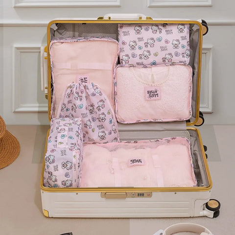 Open suitcase with 6 Piece Travel Packing Cubes Set Waterproof Pink Twill Luggage Organizers for business trips and vacays.