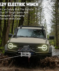 Heavy Duty 18,800 Lb Electric Winch With 78 Ft Steel Wire Rope Powers Up Extreme Off Road Recovery And Factory Loads For Serious Jammers On The Go in muddy terrain.
