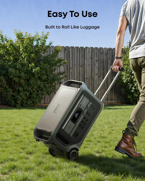 Person pulling SOLIX F3000 Portable Power Station With 3072Wh Battery And 6000W Recharging Solar Generator on grass