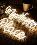 My Happy Place Neon Sign Warm White Neon Lights For Bedroom Decor Cozy Home Office Wall Art Wedding And Birthday Party Decor Gift For Girls Room Modern Neon Wall Sign laying on a patterned surface