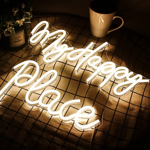 My Happy Place Neon Sign Warm White Neon Lights For Bedroom Decor Cozy Home Office Wall Art Wedding And Birthday Party Decor Gift For Girls Room Modern Neon Wall Sign laying on a patterned surface