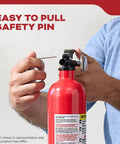 Person using easy pull pin on Home And Office Fire Extinguisher 5BC For Residential Use With Lightweight Aluminum Body