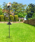 Squirrel Proof Bird Feeder Pole Kit, 92 Inch Height With 9 Prongs Base, positioned in a garden with bird feeders and birdhouse on top.