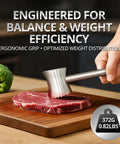 Heavy Duty Stainless Steel Meat Tenderizer Hammer With Textured Pyramid Surface shown flattening meat on cutting board
