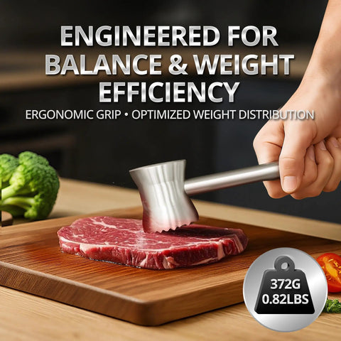 Heavy Duty Stainless Steel Meat Tenderizer Hammer With Textured Pyramid Surface shown flattening meat on cutting board
